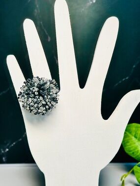 Beaded starburst or "firework" style cocktail ring, with black, silver, clear